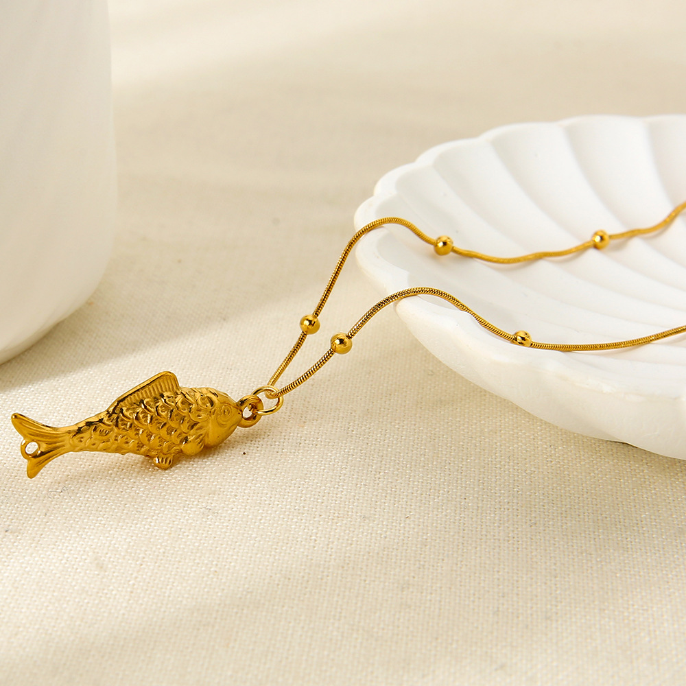 1 pezzo di collana con ciondolo a forma di tartaruga e pesce in acciaio inossidabile color oro Immagine4